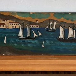 Artwork used with sea, ships and harbor image on wooden board