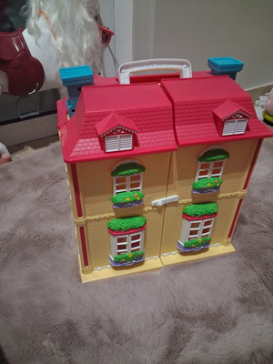 Vintage toy house with light used in good condition