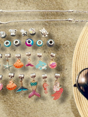 Set of 2 bracelets with 23 charms new