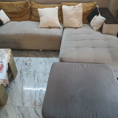 Corner sofa with ottoman