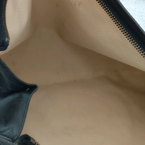 MCM unisex black nylon clutch used with leather interior
