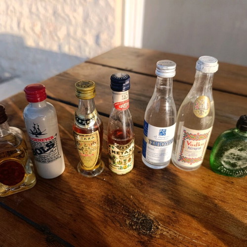 Collection of 7 collectible vintage sealed mini liquor bottles new