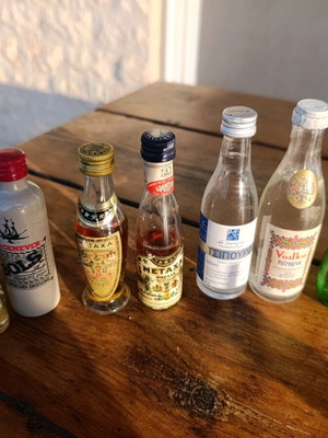 Collection of 7 collectible vintage sealed mini liquor bottles new