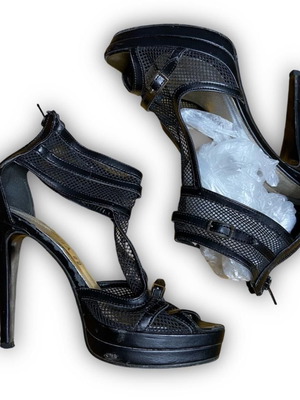 Black high-heeled shoes with mesh fabric used, size 38