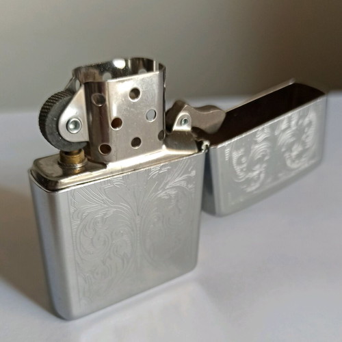 Zippo vintage lighter 2003, new, embossed design
