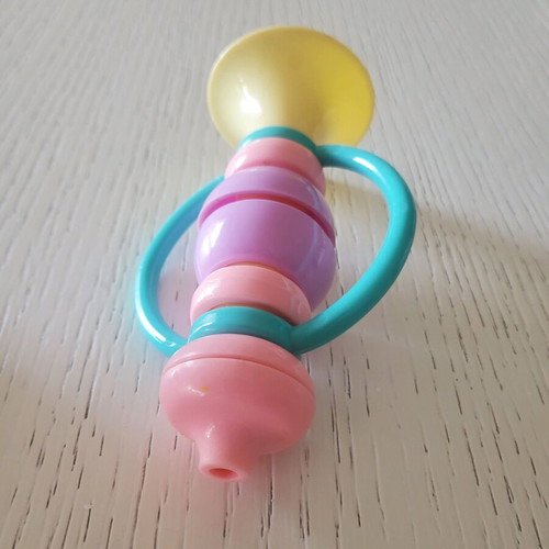 Baby toys ball and horn like new in pastel colors