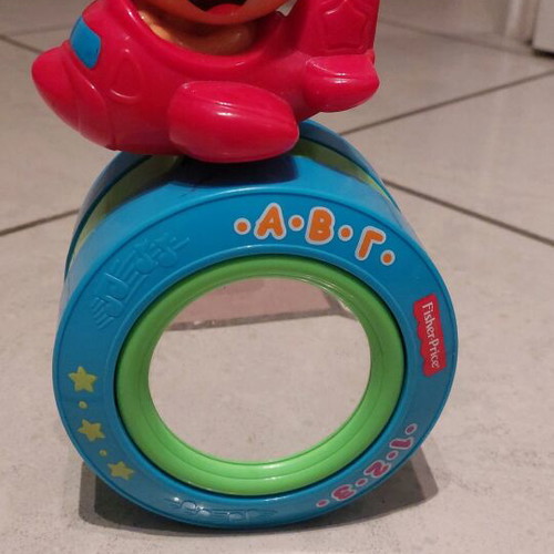 Fisher Price baby toy used with sound and movement