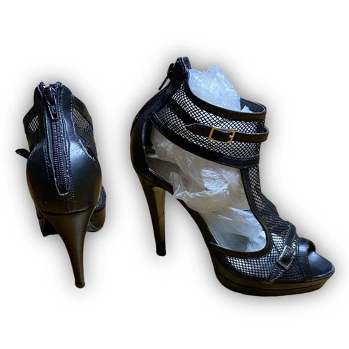 Black high-heeled shoes with mesh fabric used, size 38