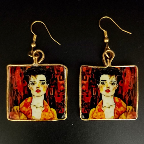 Earrings handmade with Egon Schiele inspired female face art