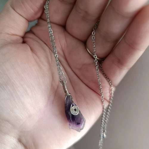 Amethyst wire-wrapped pendant on steel chain