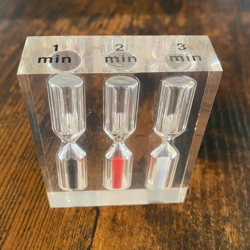 Hourglass with 3 time intervals (1, 2, and 3 minutes) used