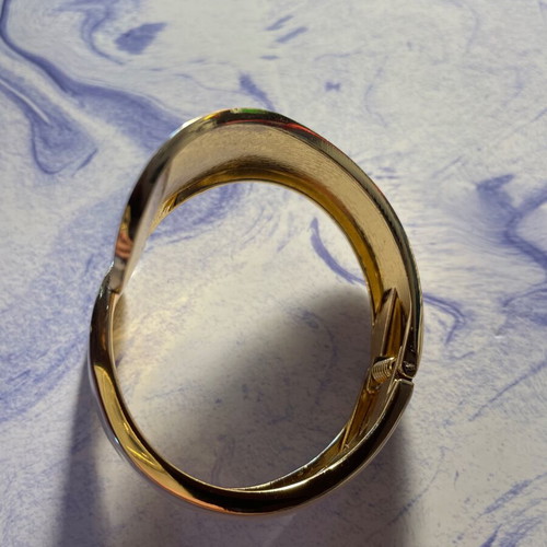 Gold and white bracelet new, opens and closes