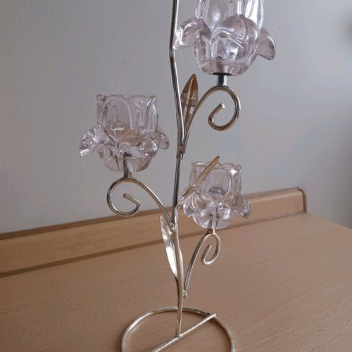 Silver-plated tealight candle holder used with pink flowers