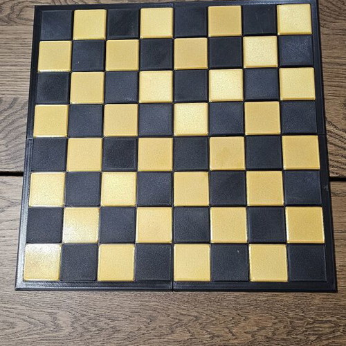 Chessboard in black and gold color, new