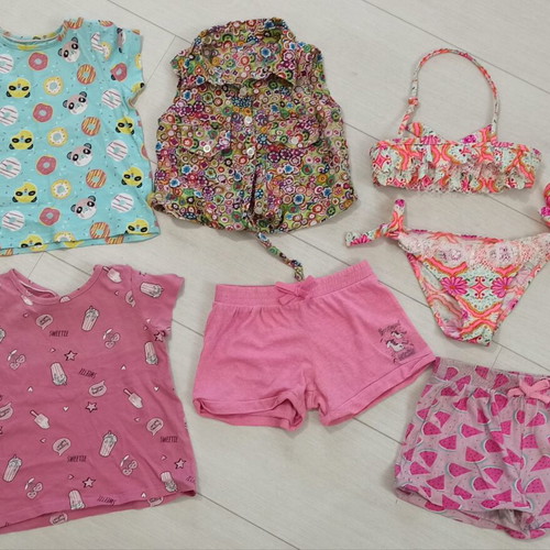 Baby clothing set like new, includes bikini, shirts, shorts up to 2 years