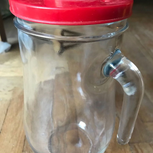Glass jug with plastic lid used, retro style