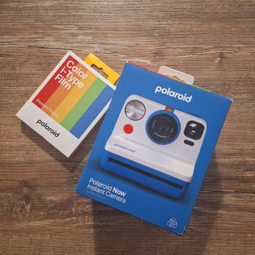 Polaroid camera new with bonus film packs
