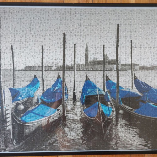 Framed puzzle like new, dimensions 0.53x0.73 m