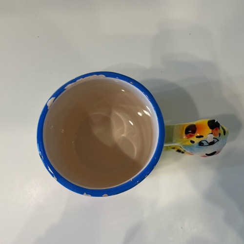 Tiger design mug used, small rim damages
