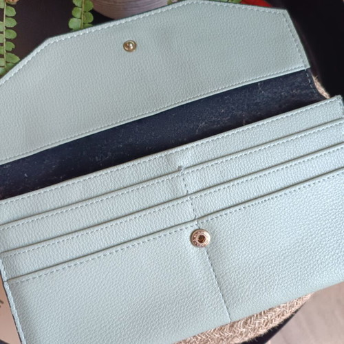 Women's wallet used, turquoise color