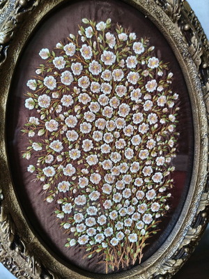 Very old raised embroidery in oval frame like new