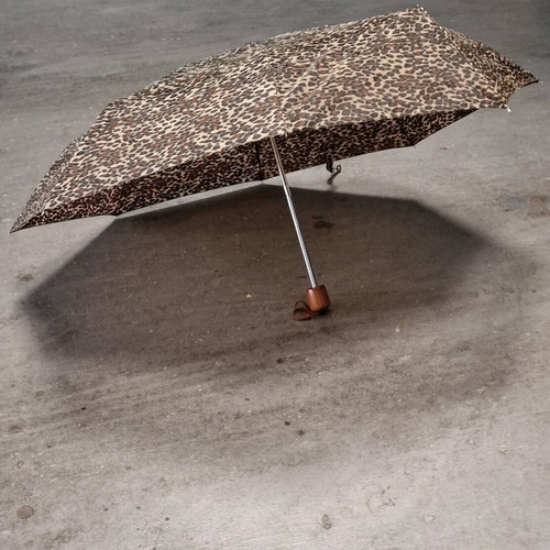 Small umbrella used, beige