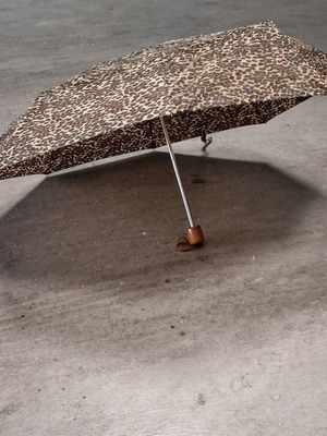 Small umbrella used, beige