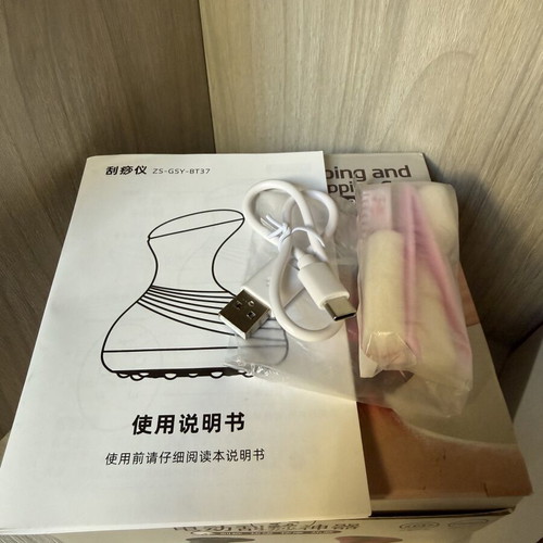 Electric body massage device with cupping and heating