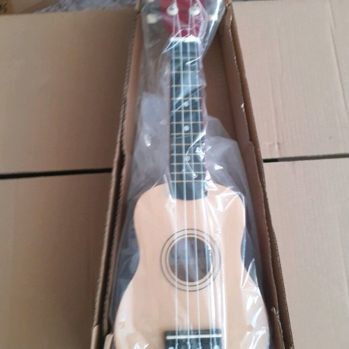Ukulele small new, elegant craft