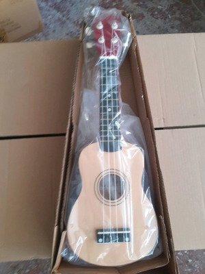 Ukulele small new, elegant craft
