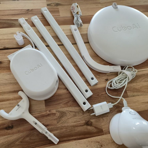 CuboAi Plus Smart Baby Monitor used with floor, crib and table stands