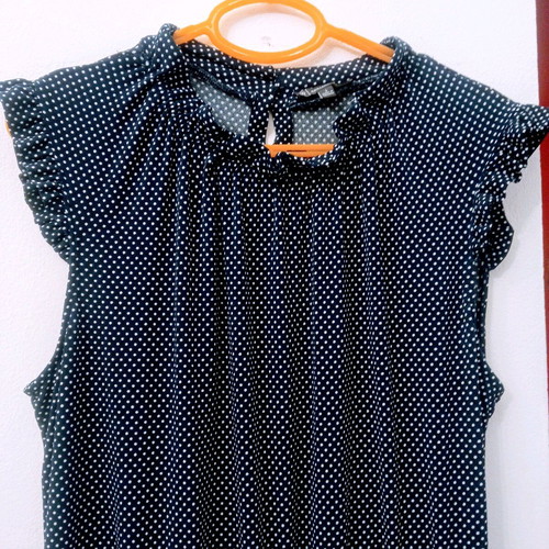 One-piece very stretchy with shoulder ruffle size L like new, blue