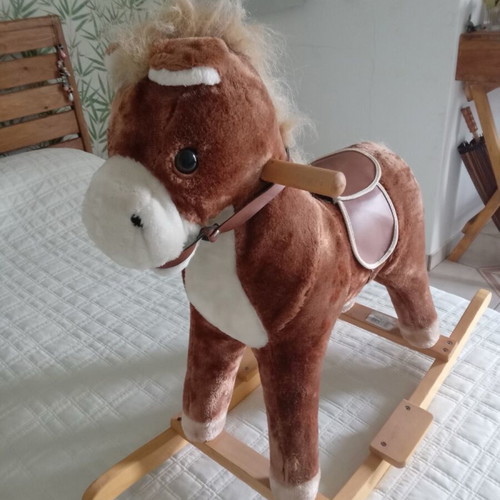 Retro rocking horse toy used with wooden details