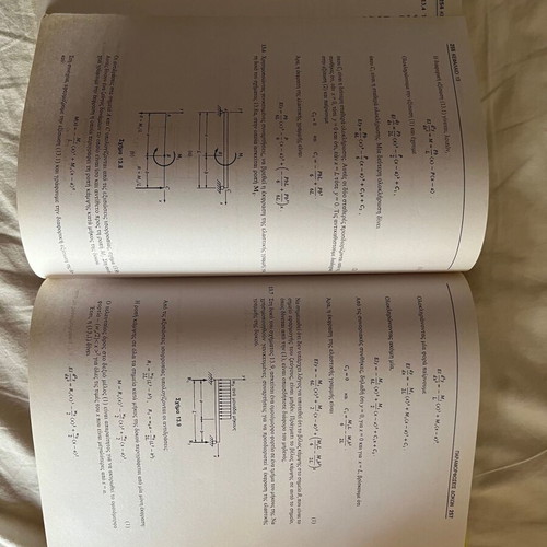 Static and Mechanics of Materials by William A. Nash new academic book