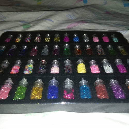 Set of 48 Glitter and Nail Art Flakes in Glass Bottles with Metal Case