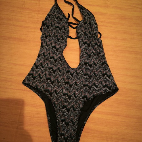 One-piece swimsuit like new with small beads, black and multicolor