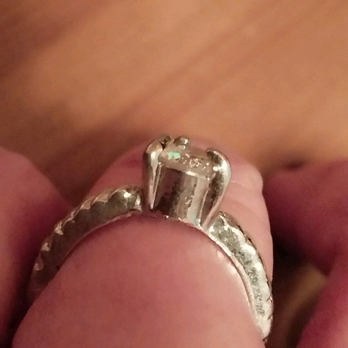 Solitaire ring up to 17mm in like new condition, silver