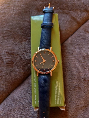 Watch new blue with gold details and small diamonds
