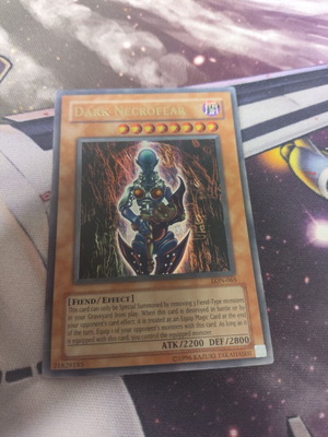 Dark Necrofear Yu-Gi-Oh card used, damaged