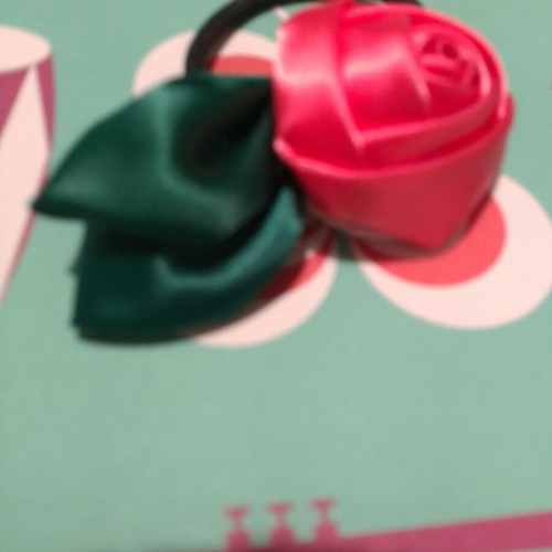 Hair accessory with fabric rose, coral and green