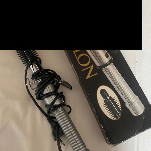 Revlon straightener and curling iron new