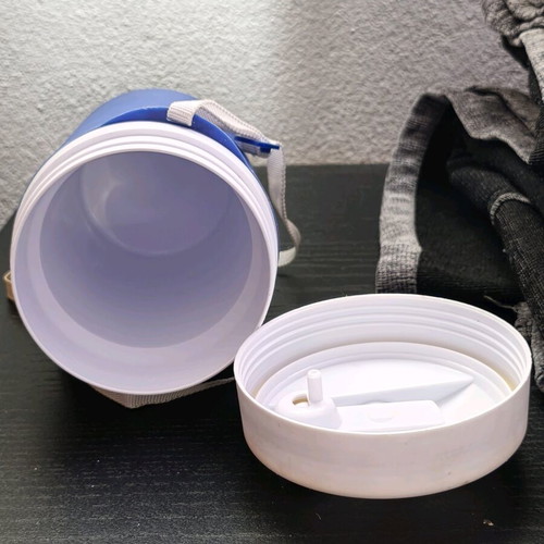 Plastic water jug like new, blue and white with straw