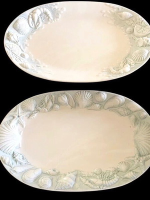 Oval ceramic platters used with summer-themed carving