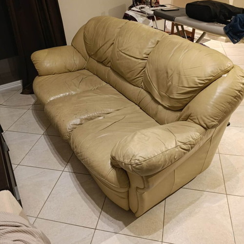 Three-seater leather sofa used