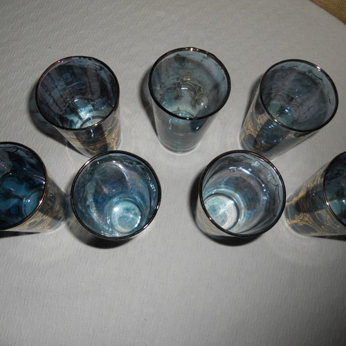 Set of 7 vintage blue-turquoise drinking glasses with gold Arabic decoration