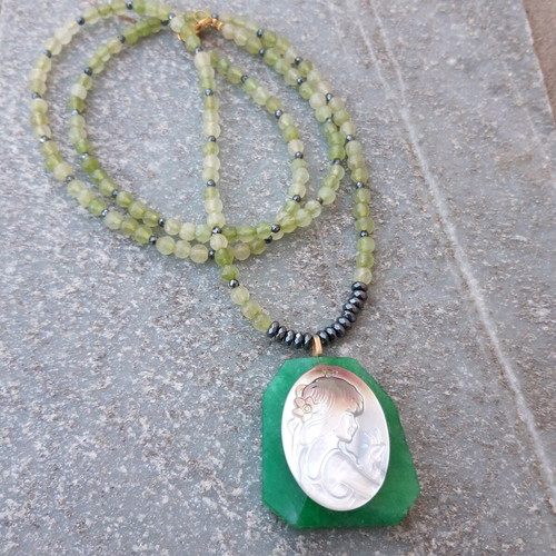 Handmade necklace like new with semi-precious stones and carved cameo