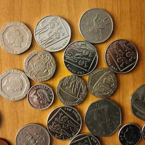 Great Britain coin collection, pack of 32 pence and pounds