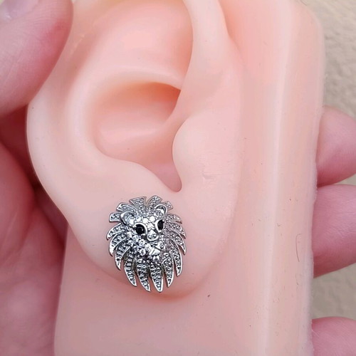 Stainless steel lion head stud earrings with zirconia