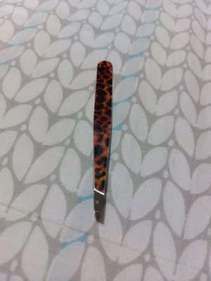 Tweezers leopard print like new
