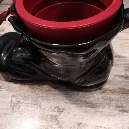 Vintage black boot-shaped planter like new